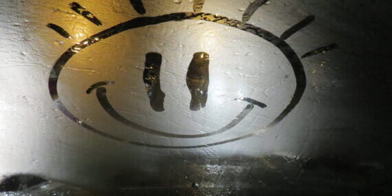 Smiley,Face,On,Foggy,Windshield