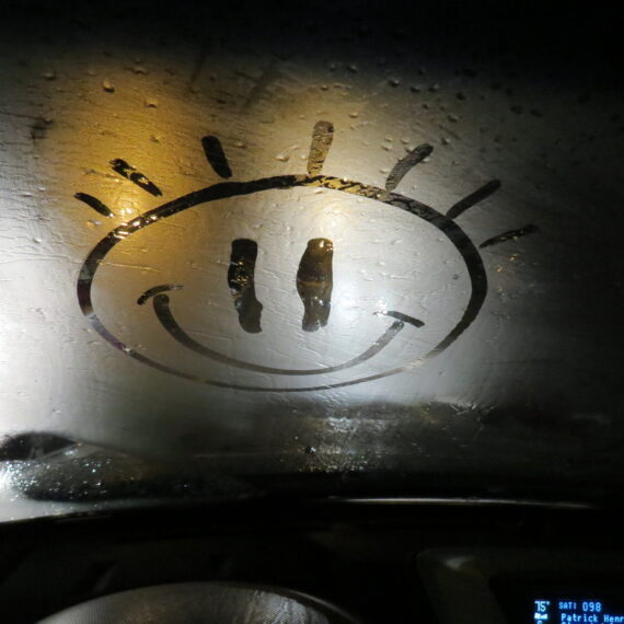 Smiley,Face,On,Foggy,Windshield